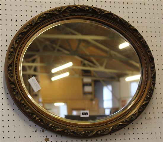 Oval gilt frame wall mirror